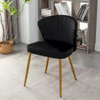 Fauteuil d'appoint moderne en velours avec design capitonné, assise sans accoudoirs confortable et tendance.